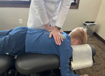Patient being given a Chiropractic Adjustment